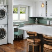 Stacked laundry and desk nook in kitchen