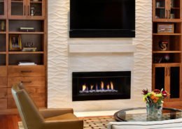 A textured fireplace offers an organic feel in this Palo Alto living room.