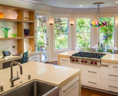 A contemporary kitchen in Atherton gets a touch of whimsy from colorful accents.