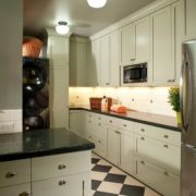 Kitchen with stacked laundry