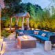An outdoor Design + Build project featuring a fire pit and trellis.