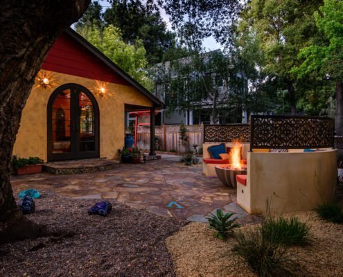 outdoor seating area around fire pit in backyard