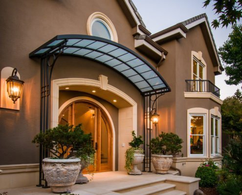 A contemporary home in Atherton includes touches of whimsy, and an art nouveau-inspired awning.