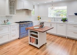 A Menlo Park kitchen adds a pop of color with a beautiful blue stove.