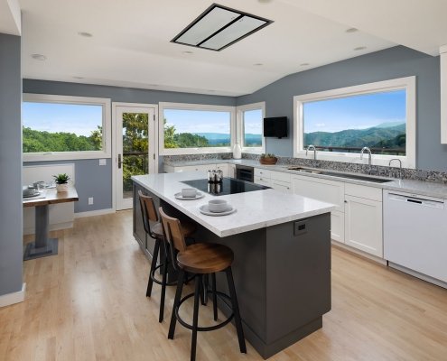 A kitchen in Los Altos Hills has panoramic views and plenty of room to cook together.