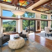 A Portola Valley home features picturesque windows and ceilings that create visual interest.