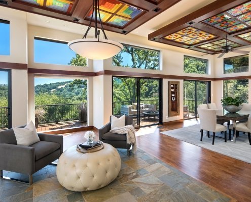 A Portola Valley home features picturesque windows and ceilings that create visual interest.