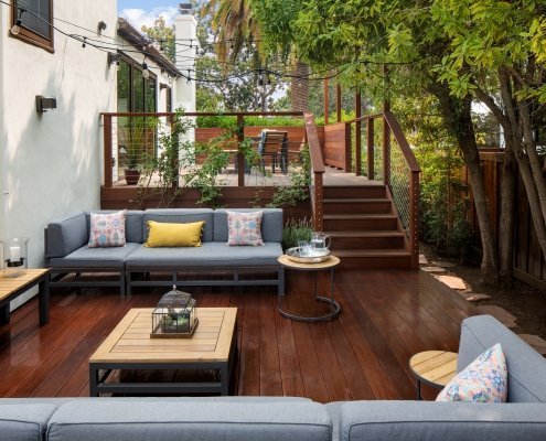 Comfortable couches in outdoor seating area on wooden deck in Mountain View
