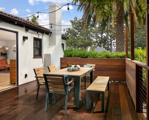 Beautiful outdoor dining table on wooden deck