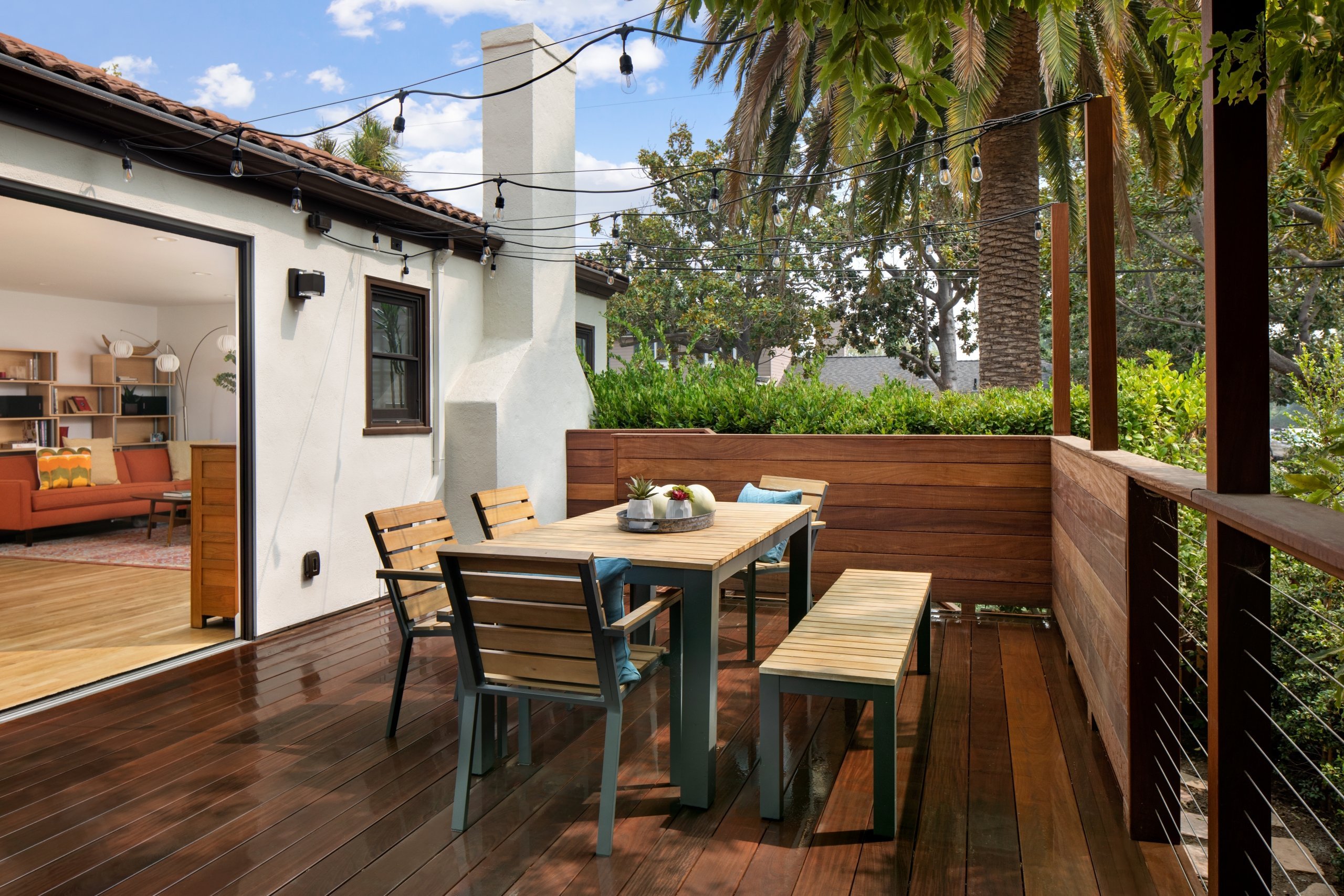 Beautiful outdoor dining table on wooden deck