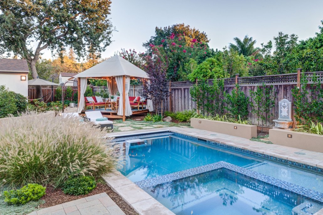 gazebo outdoor seating and pool daytime