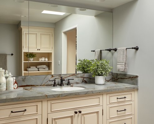 Large mirrors in this luxurious Los Gatos bathroom make the space feel bright and spacious.